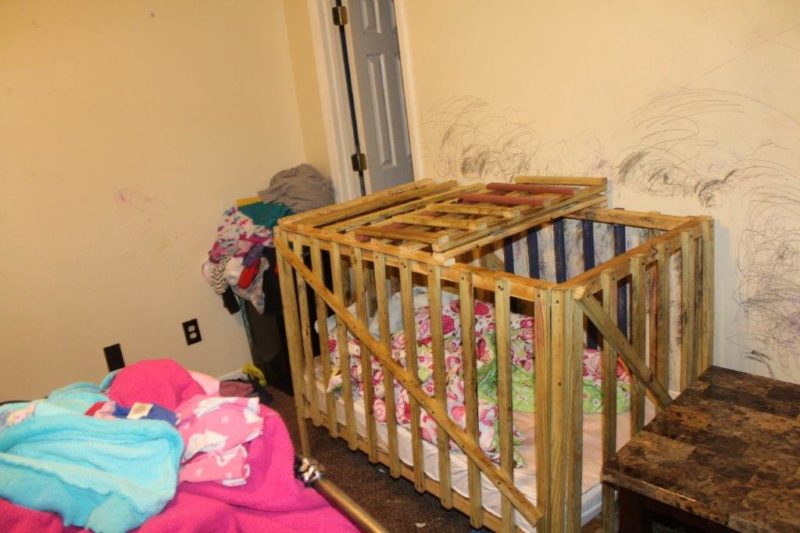 Mom, Grandparents Charged with Child Neglect After Locking Children in Wooden 'Crib-Cages'