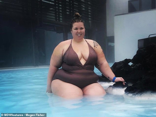 Megan Fisher posing in the pool